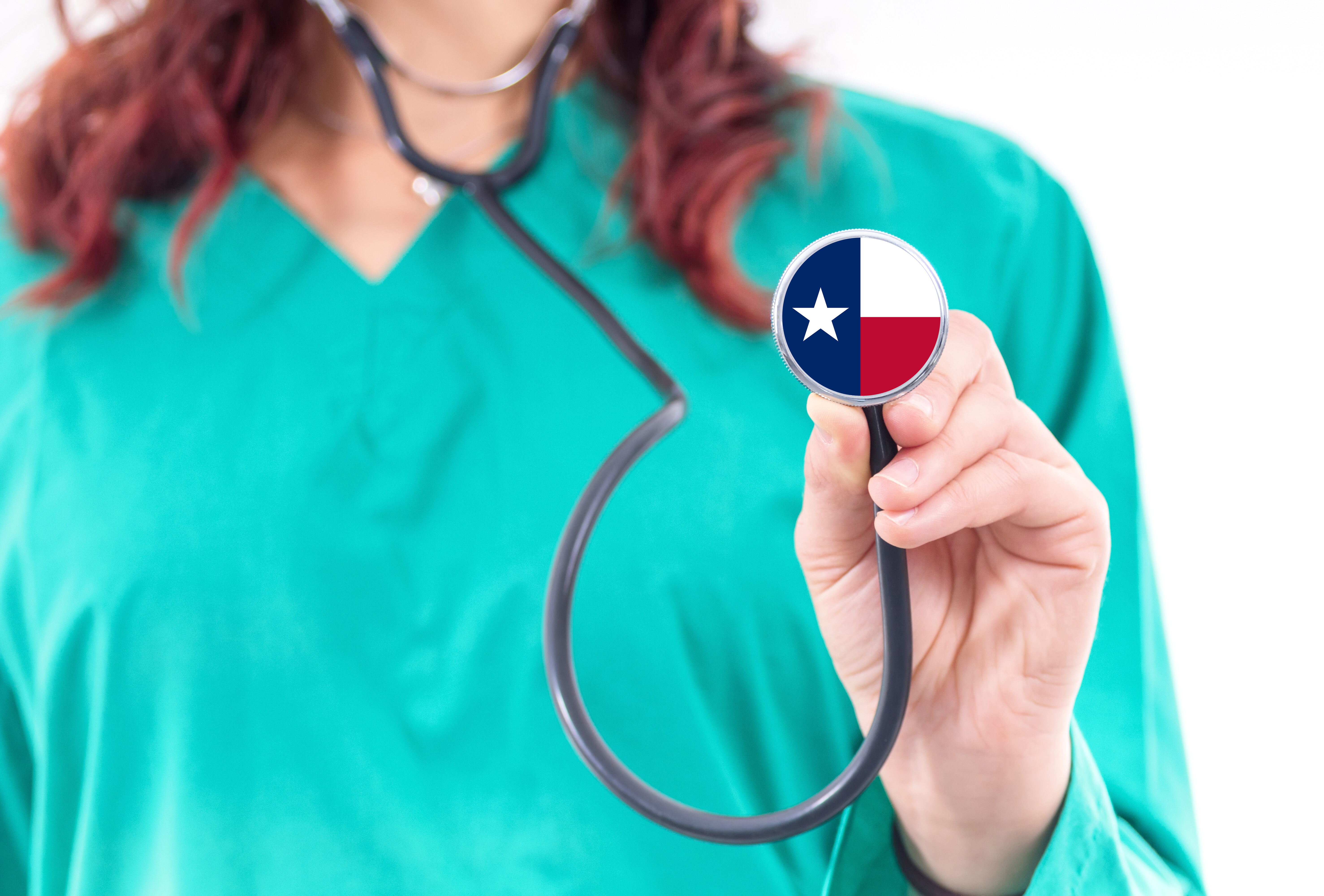 Texas national healthcare system, Texas female doctor with stethoscope